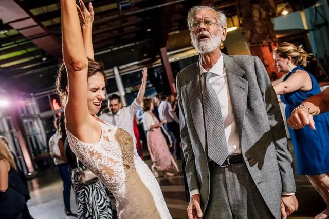 Guests of every age dancing at a wedding reception